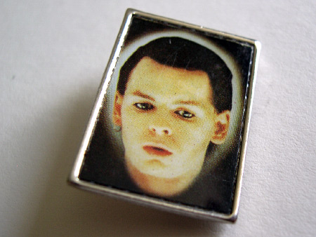 Gary Numan metal 'Telekon' lapel badge design