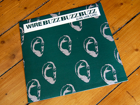 Wire 'Buzz Buzz Buzz (Live Live Live) limited edition 12 inch single front cover design