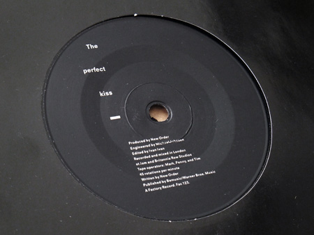 New Order - The Perfect Kiss UK 7" label side 1.