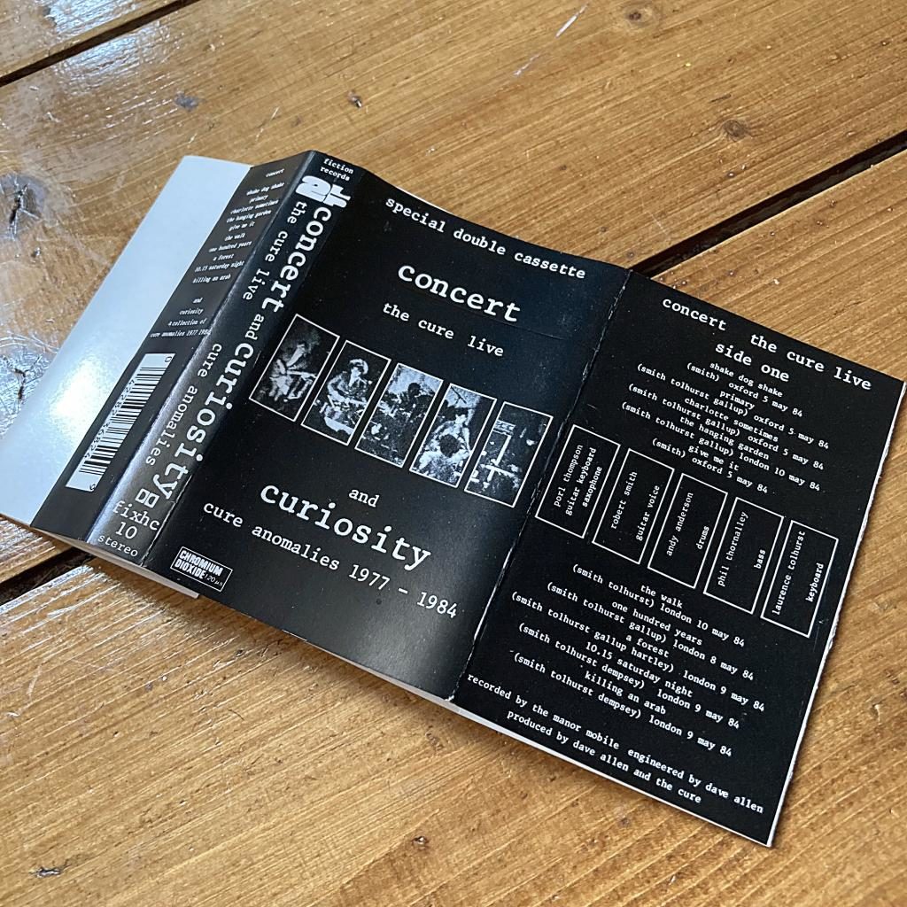 The Cure 'Concert and Curiosity' UK cassette inlay side 1