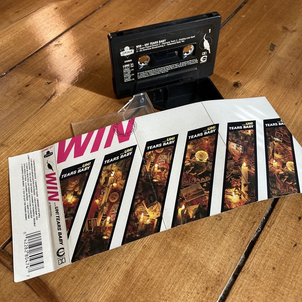 Win 'Uh! Tears Baby (A Trash Icon)' cassette inlay front